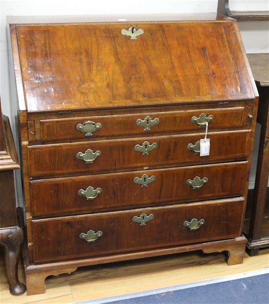 A George III walnut bureau W.95cm